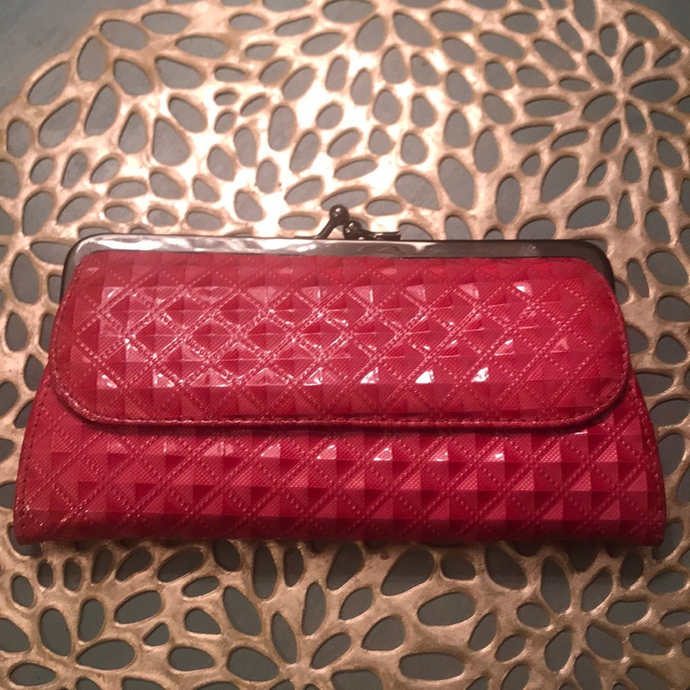 Pink pleather clutch